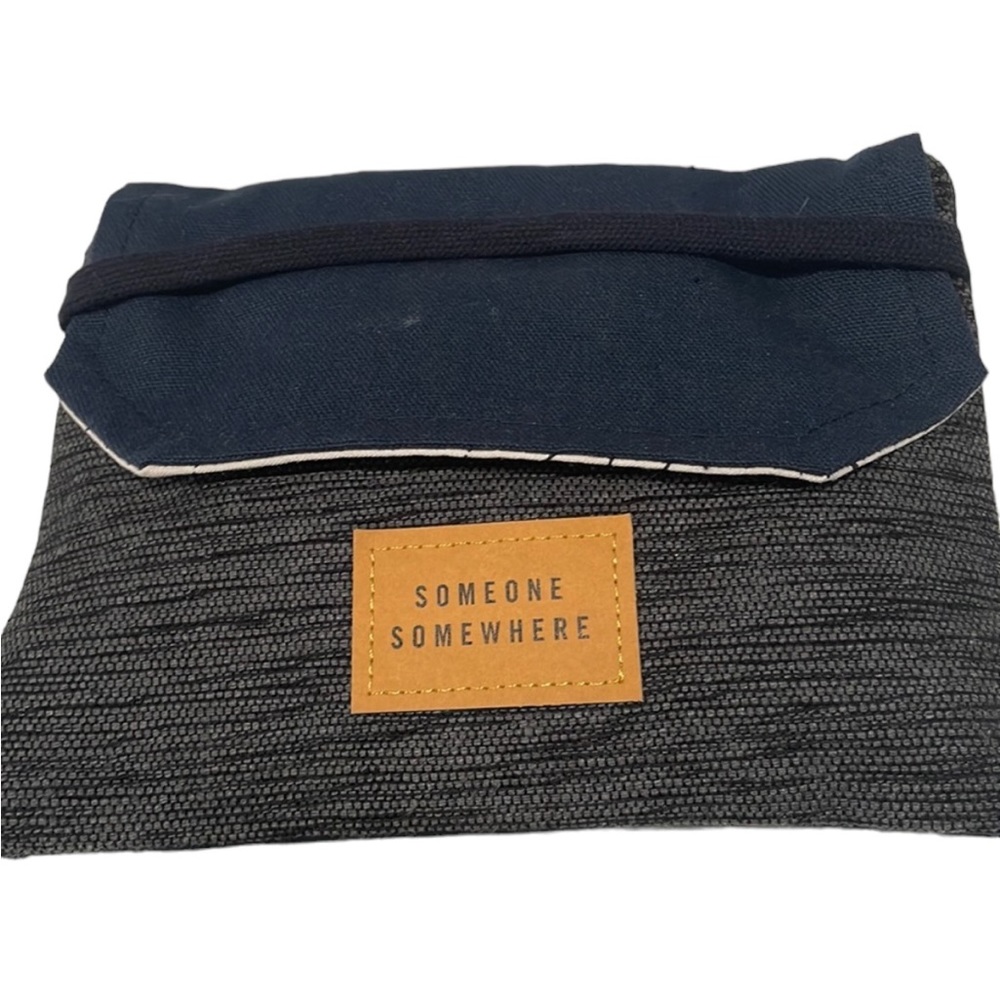 Delta One Someone Somewhere Artisan-Made Amenity Kit. Navy and Charcoal. NEW